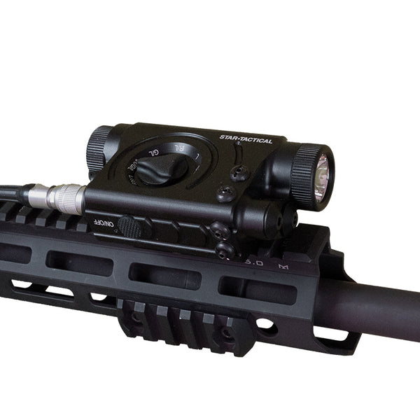 Star Tactical Trio 1200 lumens led red green and IR laser combo illuminator mounted on top of rifle